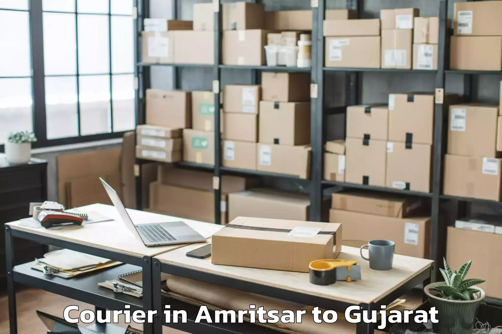 Reliable Amritsar to Dantiwada Courier